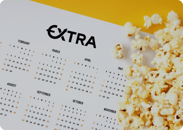 Kalender mit dem Extra Karte Logo und Popcorn