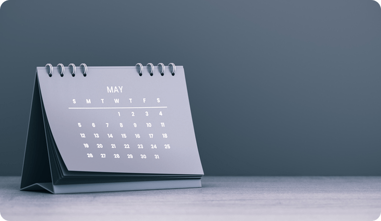 grey calendar on table